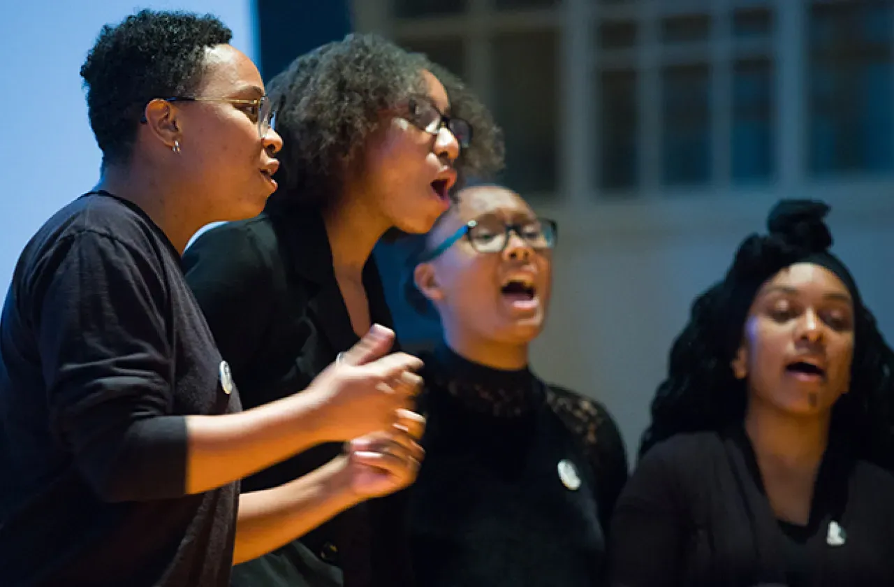 A capella group singing at Otelia Cromwell Day